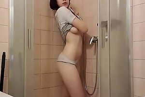 Beautiful brunette teen masturbate in the shower