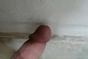 Cock cums on wall